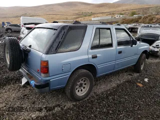 1992 Isuzu Rodeo z VIN 4S2CY58Z2N4333410, wystawiony jako Copart lot #74507154 z przebiegiem 264 327 mil mil oraz Szkody całkowita. Historia ofert i sprzedaży dostępna na DreamBid. Obrazek 3.