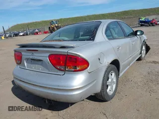 2003 Oldsmobile Alero GL1 with VIN 1G3NL52F33C218996, listed as a IAAI auction lot 41548938 with 75,639 mi miles and . Bid and sale history available at DreamBid. Image 4.