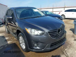 2016 Mazda CX-5 Touring with VIN JM3KE4CY3G0672977, listed as a IAAI auction lot 41889137 with 130,593 mi miles. Bid and sale history available at carsss.com. Image 1.