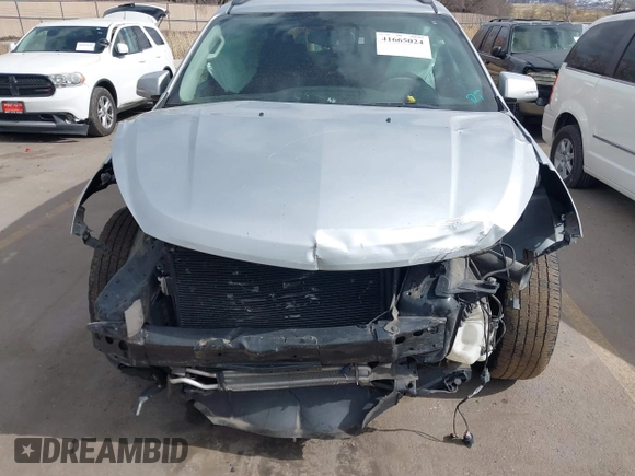 2013 Chevrolet Traverse LT with VIN 1GNKVGKD6DJ240146, listed as a IAAI auction lot 41665024 with 118,648 mi miles and . Bid and sale history available at DreamBid. Image 13.