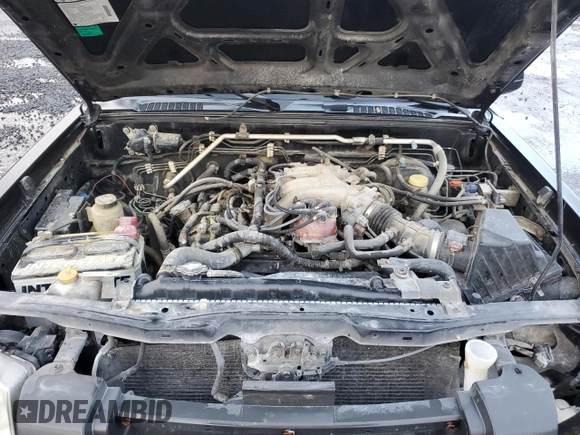 2002 Nissan Frontier XE with VIN 1N6ED26Y52C361595, listed as a Copart auction lot 77796414 with 170,555 mi miles and Salvage title. Bid and sale history available at DreamBid. Image 11.