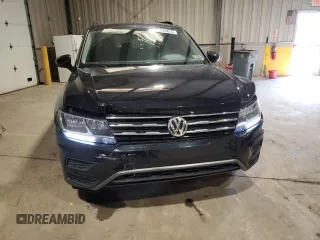 2021 Volkswagen Tiguan SE with VIN 3VV2B7AXXMM071024, listed as a Copart auction lot 52243675 with 31,448 mi miles and Salvage Title. Bid and sale history available at DreamBid. Image 5.
