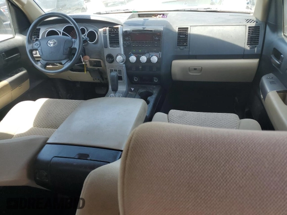 2012 Toyota Tundra with VIN 5TFRM5F14CX039145, listed as a Copart auction lot 56520015 with 129,114 mi miles and Salvage title. Bid and sale history available at DreamBid. Image 8.