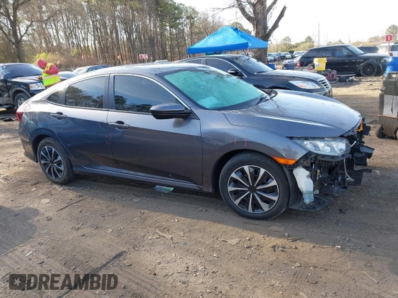 2017 Honda Civic Sedan LX with VIN 19XFC2F56HE233741, listed as a IAAI auction lot 42022068 with 65,587 mi miles. Bid and sale history available at carsss.com. Image 13.