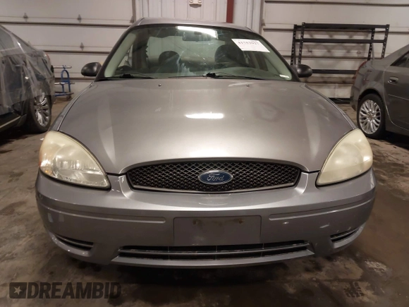 2006 Ford Taurus SE with VIN 1FAFP53U86A113947, listed as a IAAI auction lot 41753927 with 203,867 mi miles. Bid and sale history available at carsss.com. Image 12.
