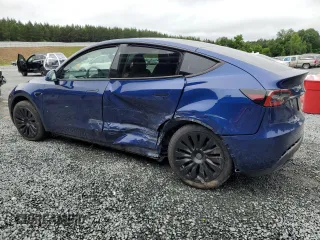 2024 Tesla Model Y Long Range with VIN 7SAYGDEE2RA246685, listed as a Copart auction lot 58699895 with 15,803 mi miles and Salvage title. Bid and sale history available at DreamBid. Image 2.