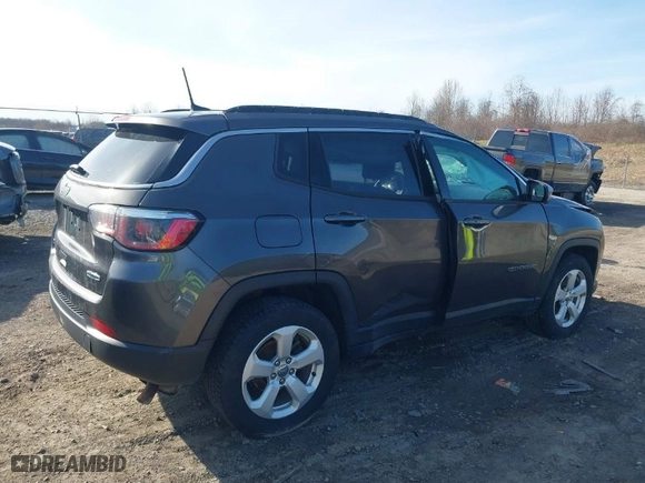 2019 Jeep Compass Latitude with VIN 3C4NJDBB2KT760879, listed as a IAAI auction lot 41828861 with 68,450 mi miles. Bid and sale history available at carsss.com. Image 4.