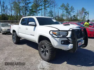 2019 Toyota Tacoma SR z VIN 3TMCZ5AN6KM229597, wystawiony jako IAAI lot #41828835 z przebiegiem 134 907 mil mil oraz . Historia ofert i sprzedaży dostępna na DreamBid. Obrazek 1.