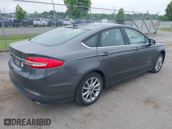 2017 Ford Fusion Hybrid SE with VIN 3FA6P0LU2HR301083, listed as a IAAI auction lot 42602798 with 89,003 mi miles and . Bid and sale history available at DreamBid. Image 4.