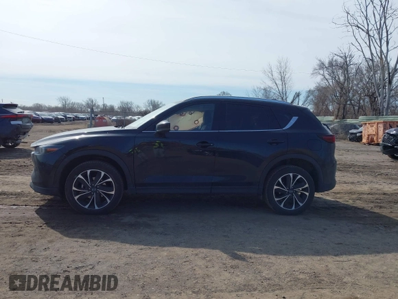 2023 Mazda CX-5 S Premium with VIN JM3KFBDM7P0201038, listed as a IAAI auction lot 41772989 with 26,227 mi miles and . Bid and sale history available at DreamBid. Image 14.