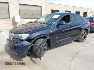 2015 BMW X4 xDrive35i with VIN 5UXXW5C50F0E87728, listed as a IAAI auction lot 41819628 with 136,042 mi miles and . Bid and sale history available at DreamBid. Image 19.
