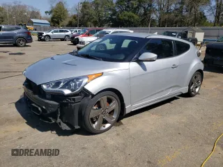 2015 Hyundai Veloster Turbo with VIN KMHTC6AE5FU249280, listed as a Copart auction lot 48199085 with 77,216 mi miles and Salvage Title. Bid and sale history available at carsss.com. Image 1.