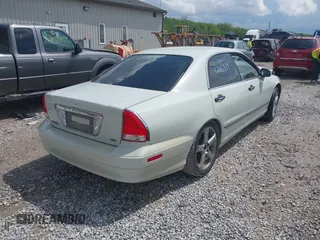 2002 Mitsubishi Diamante LS z VIN 6MMAP57P72T008216, wystawiony jako IAAI lot #42168379 z przebiegiem 154 285 mil mil oraz . Historia ofert i sprzedaży dostępna na DreamBid. Obrazek 4.