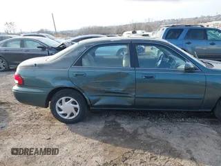 1999 Mazda 626 ES with VIN 1YVGF22C0X5835930, listed as a IAAI auction lot 41666820 with 93,973 mi miles. Bid and sale history available at carsss.com. Image 6.