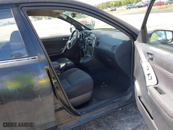 2003 Toyota Matrix Std with VIN 2T1KR32E63C116953, listed as a IAAI auction lot 41929877 with 299,999 mi miles. Bid and sale history available at carsss.com. Image 5.