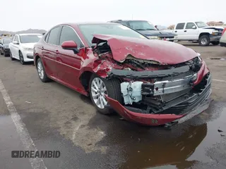2020 Toyota Camry LE with VIN 4T1C11AK0LU954420, listed as a IAAI auction lot 41576657 with 56,863 mi miles. Bid and sale history available at carsss.com. Image 1.