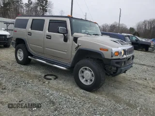 2004 Hummer H2 with VIN 5GRGN23U24H118230, listed as a Copart auction lot 87764075 with 202,206 mi miles and Salvage Title. Bid and sale history available at carsss.com. Image 4.