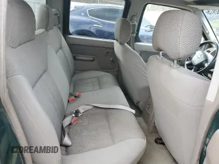 2002 Nissan Frontier SE with VIN 1N6ED27T42C378228, listed as a Copart auction lot 50562975 with 287,368 mi miles and Salvage title. Bid and sale history available at DreamBid. Image 10.