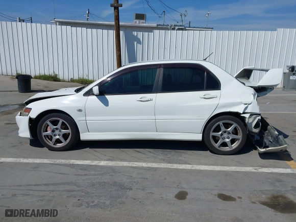 2005 Mitsubishi Lancer Evolution VIII with VIN JA3AH86DX5U054278, listed as a IAAI auction lot 41881180 with 157,497 mi miles. Bid and sale history available at carsss.com. Image 14.