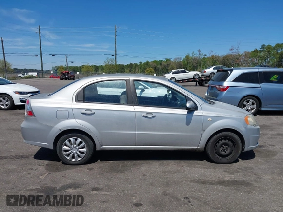 2007 Chevrolet Aveo LS with VIN KL1TD56617B098732, listed as a IAAI auction lot 41889243 with 115,426 mi miles and . Bid and sale history available at DreamBid. Image 13.