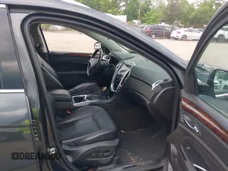2014 Cadillac SRX Luxury Collection z VIN 3GYFNEE38ES626949, wystawiony jako IAAI lot #42194679 z przebiegiem 173 303 mil mil oraz . Historia ofert i sprzedaży dostępna na DreamBid. Obrazek 5.