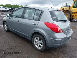 2009 Nissan Versa S with VIN 3N1BC13E19L473132, listed as a IAAI auction lot 42349859 with 122,272 mi miles and . Bid and sale history available at DreamBid. Image 6.