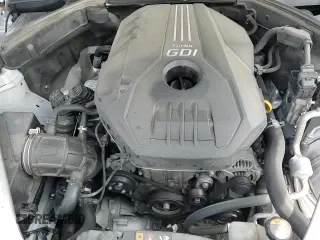 2022 Genesis G70 2.0T with VIN KMTG34TAXNU102098, listed as a Copart auction lot 65602435 with 79,110 mi miles and Salvage title. Bid and sale history available at DreamBid. Image 16.