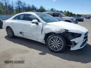 2020 Mercedes-Benz CLA 250 with VIN WDD5J4HB4LN077693, listed as a Copart auction lot 56899695 with 26,656 mi miles and Salvage title. Bid and sale history available at DreamBid. Image 4.