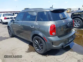 2014 MINI Countryman S with VIN WMWZC3C59EWP29137, listed as a IAAI auction lot 42661922 with 128,064 mi miles and . Bid and sale history available at DreamBid. Image 3.