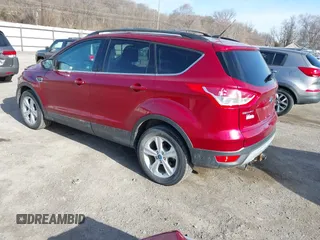 2013 Ford Escape SE z VIN 1FMCU9GXXDUC32561, wystawiony jako IAAI lot #41797455 z przebiegiem 134 934 mil mil oraz . Historia ofert i sprzedaży dostępna na DreamBid. Obrazek 3.