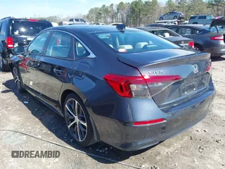 2023 Honda Civic Sedan Touring with VIN 2HGFE1F92PH318894, listed as a IAAI auction lot 41665714 with 15,746 mi miles. Bid and sale history available at carsss.com. Image 3.