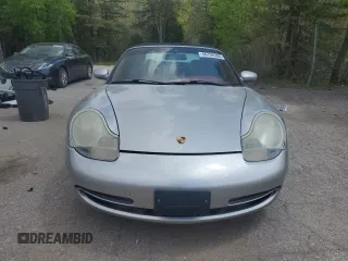 2000 Porsche 911 z VIN WP0CA2992YS654053, wystawiony jako Copart lot #56706365 z przebiegiem 153 481 mil mil oraz Czysty tytuł • Clean title. Historia ofert i sprzedaży dostępna na DreamBid. Obrazek 5.