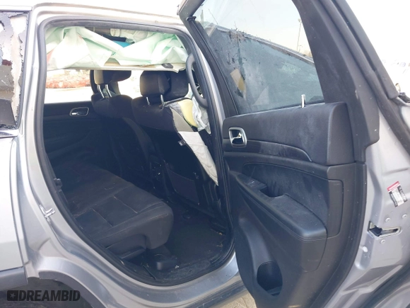2018 Jeep Grand Cherokee Laredo E with VIN 1C4RJFAG8JC130465, listed as a IAAI auction lot 41789688 with 133,299 mi miles. Bid and sale history available at carsss.com. Image 8.
