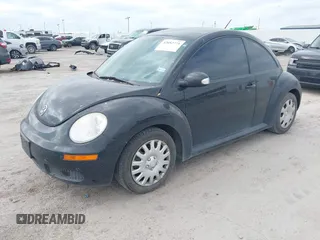 2010 Volkswagen New Beetle Coupe with VIN 3VWPG3AG9AM015051, listed as a IAAI auction lot 42052771 with 163,728 mi miles. Bid and sale history available at carsss.com. Image 2.