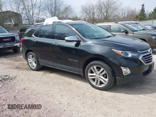 2019 Chevrolet Equinox Premier z VIN 2GNAXYEX5K6143922, wystawiony jako IAAI lot #42134219 z przebiegiem 105 496 mil mil oraz . Historia ofert i sprzedaży dostępna na DreamBid. Obrazek 1.