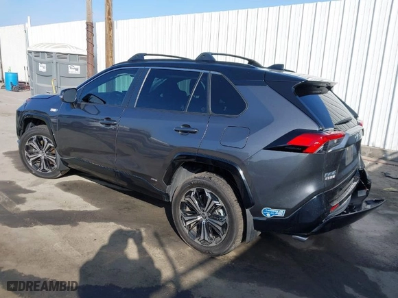 2021 Toyota RAV4 Prime XSE with VIN JTMFB3FV7MD009740, listed as a IAAI auction lot 41666510 with 59,950 mi miles. Bid and sale history available at carsss.com. Image 3.