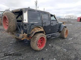2018 Jeep Wrangler JK Unlimited Rubicon Recon with VIN 1C4BJWFG9JL844051, listed as a IAAI auction lot 40923174 with 64,309 mi miles. Bid and sale history available at carsss.com. Image 4.
