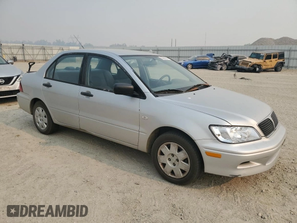 2002 Mitsubishi Lancer ES with VIN JA3AJ26E22U045919, listed as a Copart auction lot 63852225 with 184,071 mi miles and Salvage title. Bid and sale history available at DreamBid. Image 4.