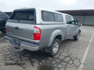 2005 Toyota Tundra SR5 with VIN 5TBDT441X5S479169, listed as a IAAI auction lot 42058790 with 323,936 mi miles and . Bid and sale history available at DreamBid. Image 4.