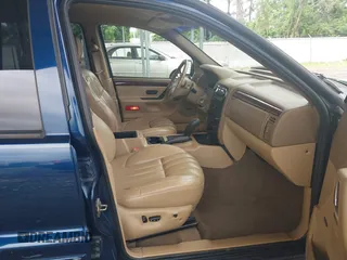 2000 Jeep Grand Cherokee Limited with VIN 1J4GW58S9YC347699, listed as a IAAI auction lot 42545373 with 118,566 mi miles and . Bid and sale history available at DreamBid. Image 5.