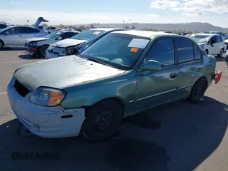 2005 Hyundai Accent GLS with VIN KMHCG45C95U620716, listed as a IAAI auction lot 41740573 with 187,971 mi miles. Bid and sale history available at carsss.com. Image 18.