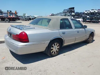 2004 Mercury Grand Marquis LS Premium with VIN 2MEFM75W04X659688, listed as a IAAI auction lot 42026540 with 144,088 mi miles and . Bid and sale history available at DreamBid. Image 4.