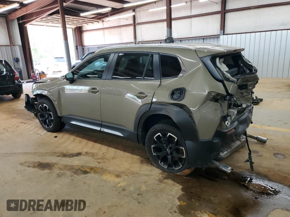 2024 Mazda CX-50 2.5 Turbo z VIN 7MMVABXY8RN229598, wystawiony jako Copart lot #52670655 z przebiegiem 21 776 mil mil oraz Szkoda całkowita • Salvage title. Historia ofert i sprzedaży dostępna na DreamBid. Obrazek 2.