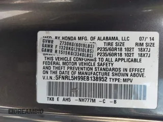 2014 Honda Odyssey Touring with VIN 5FNRL5H99EB138952, listed as a IAAI auction lot 42538833 with 146,959 mi miles and . Bid and sale history available at DreamBid. Image 9.