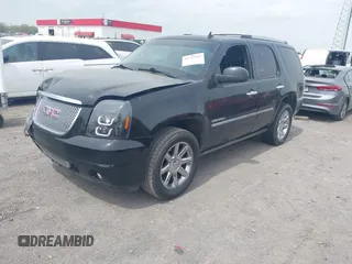 2014 GMC Yukon Denali z VIN 1GKS1EEFXER113493, wystawiony jako IAAI lot #41742662 z przebiegiem 150 382 mil mil oraz . Historia ofert i sprzedaży dostępna na DreamBid. Obrazek 19.