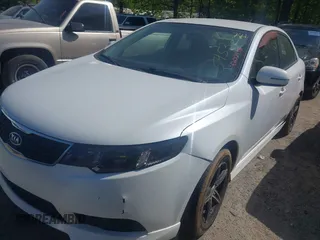 2012 Kia Forte EX with VIN KNAFU4A28C5545230, listed as a IAAI auction lot 42024581 with 292,797 mi miles. Bid and sale history available at carsss.com. Image 2.