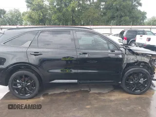 2023 Kia Sorento SX z VIN 5XYRK4LFXPG202339, wystawiony jako IAAI lot #42463572 z przebiegiem 27 928 mil mil oraz . Historia ofert i sprzedaży dostępna na DreamBid. Obrazek 14.