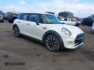 2018 MINI Hardtop 4 Door Cooper with VIN WMWXU1C57J2F80028, listed as a IAAI auction lot 41220250 with 45,245 mi miles and . Bid and sale history available at DreamBid. Image 1.