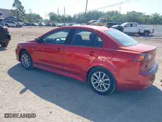 2016 Mitsubishi Lancer ES with VIN JA32U2FU6GU011198, listed as a IAAI auction lot 41932443 with 122,991 mi miles. Bid and sale history available at carsss.com. Image 3.