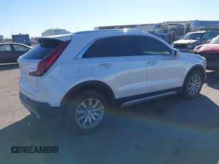 2020 Cadillac XT4 AWD Premium Luxury z VIN 1GYFZDR46LF083118, wystawiony jako IAAI lot #40495567 z przebiegiem 83 224 mil mil oraz . Historia ofert i sprzedaży dostępna na DreamBid. Obrazek 4.